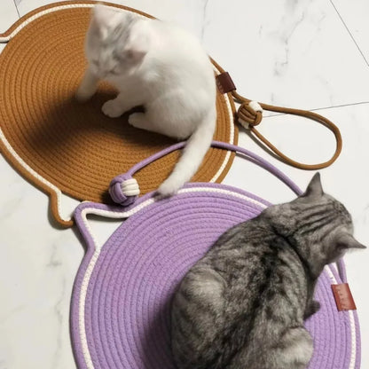 Cotton rope cat scratching post for claw grinding.