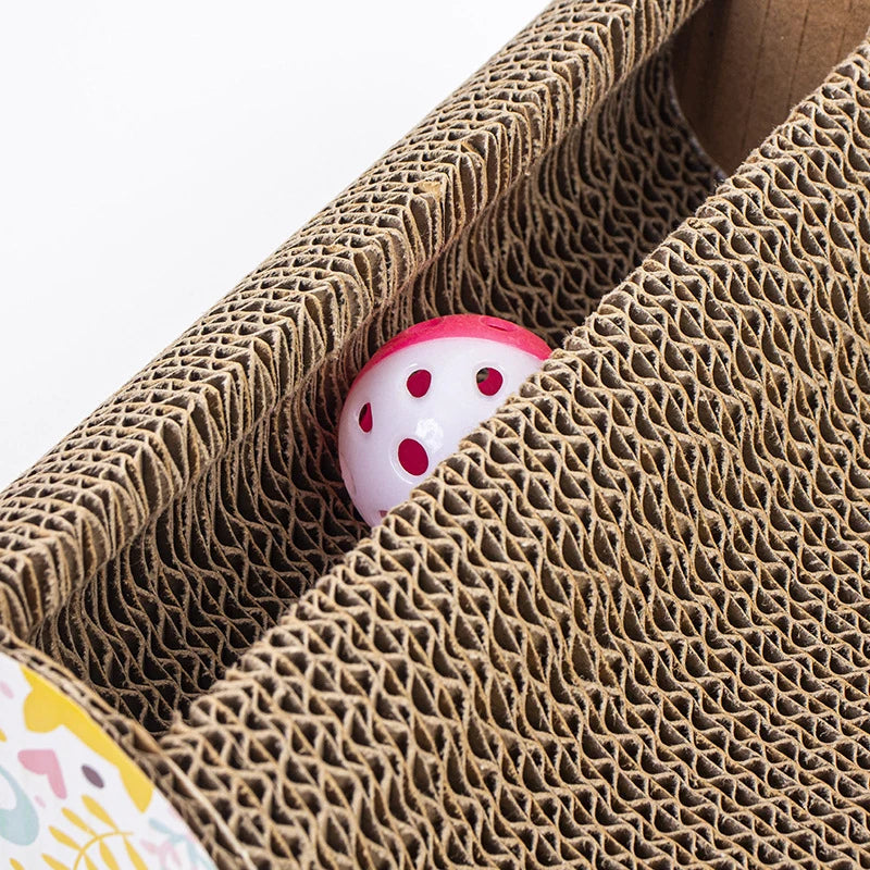 Large corrugated cat scratcher toy with bells.