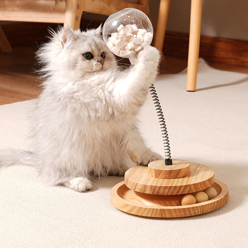 Interactive wood cat turntable toy with rolling ball.